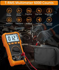 6000 Counts Digital Multimeter With TRMS Auto Range Backlit Display shown in use, with case and test leads visible