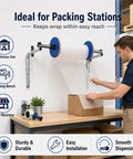 Pro Level Commercial Wall Mounted Foam Wrap Roll Dispenser For Heavy Shipping Packing And Moving With Ridiculously Strong Galvanized Steel Film Rack in use at a packing station.