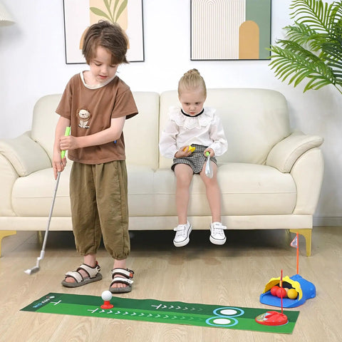 Children using Dinosaur Themed Kids Golf Set For Ages 3 To 6 With Automatic Ball Returner Light Up Balls Indoor Outdoor Putting Mat.