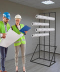 Heavy Duty Vinyl Roll Floor Storage Rack And Paper Organizer For Print Shops And Art Studios With Forty Long Shelves in use with blueprints.