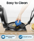 1200W Electric Roti Maker Automatically Presses Chapati Naan And Tortillas Fast Flatbread Cooker with non-stick surface being cleaned.