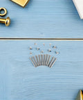 12 Pack Folding Fan Axle Rivet And Nut Repair Kit 25mm Replacement Hardware For Folding Paper Fans, Dance Fans, And DIY Handmade Fans, Quick Fix For Loose Shafts, Wobble, And Loose Fasteners. Silver rivets and nuts on blue wood