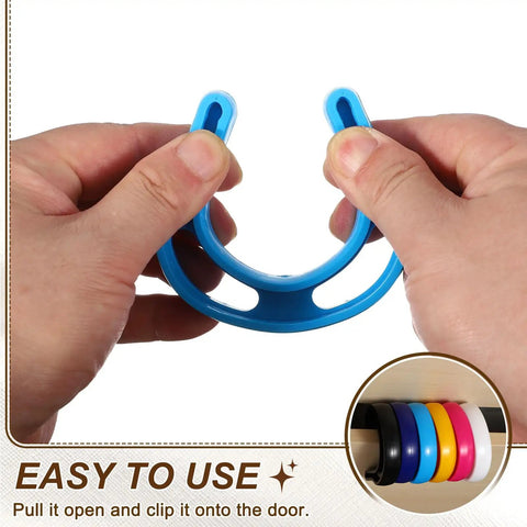 Blue Six Pack Door Pinch Guard and Slam Stopper Set Durable Plastic Door Deterrent Keeps Fingers Safe Perfect for Slamming Doors Pets and Locked Rooms 3.1x2.9 Inch Yellow being held by hands