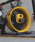 Beefy Industrial High Velocity Floor Fan With AC DC Dual Power, 18 Inch Barrel, 270 Degree Tilt, 3 Speeds, in workshop setting
