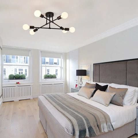 Six Lights Sputnik Style Semi Flush Mount Ceiling Chandelier In Black Finish With E26 Bulb Base in modern bedroom setting.