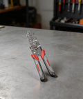 All In One Wire Stripper Tool For Electricians With Carbon Steel Pliers on a workshop table