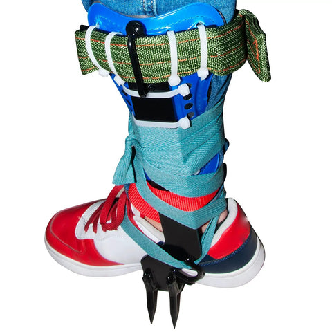 Close-up of Two Pack Tree Climbing Gear Kit with pro-grade stainless steel spikes and non-slip pedals on shoe.