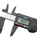 Close-up of Compact Digital Caliper 0 To 4 Inch With Inch Millimeter Conversion And Auto Off showing 18.60 inches on display.