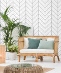 Living room with Black And White Peel And Stick Wallpaper For Easy DIY Decor, Modern Striped Geometric Herringbone Self Adhesive Removable Contact Paper For Walls And Furniture, 17.71 By 118 Inches, Great For Home Renovation Projects behind rattan sofa and plants.