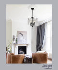 17 Inch Black Crystal Chandelier With Matte Black Frame Modern Mid Century Pendant Light Fixture in a living room.