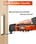 Go-To Do It All Oscillating Multi Tool With 3.5 Amp Motor cutting wood, featuring a soft rubber handle for comfort