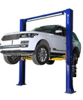 APlusLift HW-10KOH-A two-post overhead car lift, blue posts, white Range Rover raised.