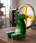 Beefy Professional Grade Manual Arbor Press Machine Anchored By A Solid Cast Iron Base Desktop Punch Stamping Tool close-up on a wooden table