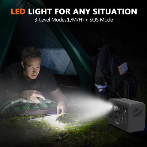 256Wh LiFePO4 Portable Power Station with LED light outdoors near camping tent