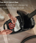 HyClean Air CO Vacuum Bags inside a canister vacuum, designed for hygienic bag changes and dust containment.