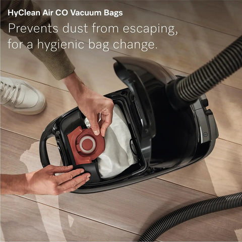 HyClean Air CO Vacuum Bags inside a canister vacuum, designed for hygienic bag changes and dust containment.