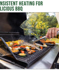 Propane grill scene with a hand using tongs to cook corn and vegetables outdoors.