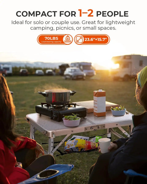 Adjustable Camping Table Folding Lightweight 5Lb Table with Four Height Levels outdoor dinner setup at campsite