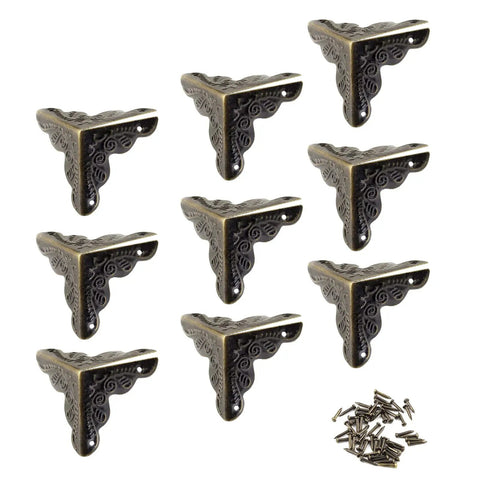 Legit Heavy Duty 48 Pack Antique Bronze Furniture Corner Protectors Featuring Rock Solid One Inch Metal Edge Guards With Installation Screws For Quick Cabinet Fixups showing 9 corner protectors and installation screws.