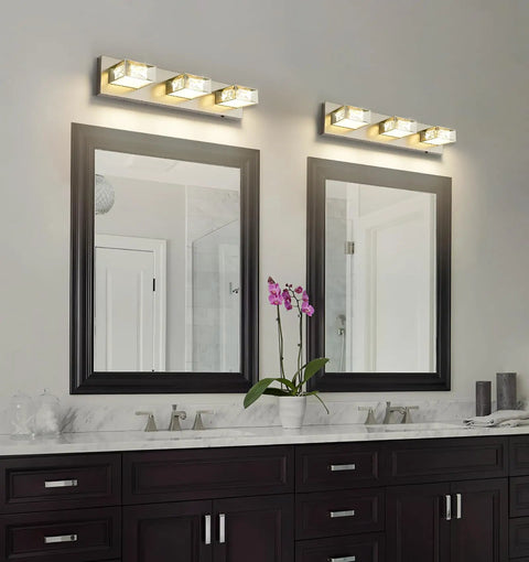 Dope Four Light Chrome Finish Crystal LED Vanity Light Over Mirror Dimmable Wall Sconce For Bathrooms 28 Inch 24W 5500K Bright White ETL Certified Dimmable Driver Modern Sleek Vanity Lighting above dual sinks, framed mirrors.