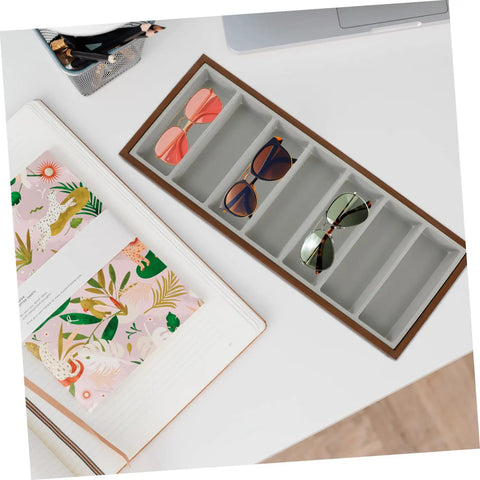 Slick Wooden Sunglasses Display Plate Featuring Seven Grid Slots For Eyeglasses Organization with pink and green sunglasses.