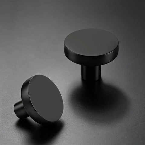 Top Tier Heavy Duty Black Cabinet Knobs Slick Round Handles For Kitchen Cupboards And Drawers Solid Zinc Alloy Hardware Built Tough Quick Install Hassle Free Setup Dependable Twenty Pack Bundle with a flat round surface.