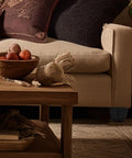 Living room scene with sofa showing Four Pack Replacement Furniture Feet For Chairs And Sofas, Black Plastic And Zinc Alloy