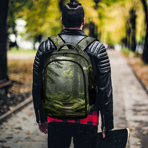 Fern Print Old Growth Forest unisex backpack with large capacity worn by person on a path, durable polyester