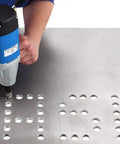German Made Portable Magnetic Drill Press With Dual Speed Controls And A Beefy 9.5 Amp Motor That Smashes Through Heavy Steel Plate, drilling into steel.