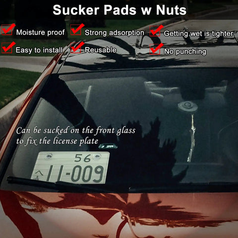 Suction cup with screws holding license plate on car windshield.