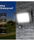 JUDYSSY Led Pir Motion Sensor Floodlight Outdoor Wall Light White Light 100W mounted on a wall, showing IP66 waterproof features.