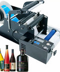 No Sweat Manual Labeling Machine And Label Applicator For Round Glass Plastic Bottles showing the unit with various beverage bottles.
