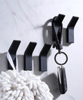 No Mess Punch Free Wall Mounted Robe Hooks Top Shelf Aluminum Towel Rack with keychain and towel holder on white wall.