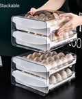 Person stacking Double Layer Egg Storage Container For Refrigerator With Drawer Style Stackable Egg Holder Clear Plastic Tray Holds 40 Eggs