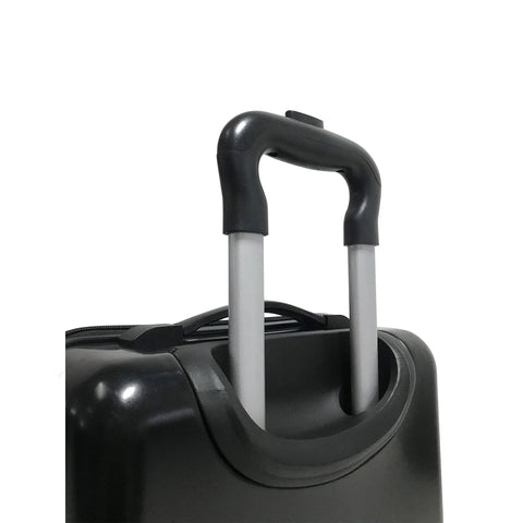 Handle and wheels of kids dinosaur carry on luggage, close-up view