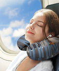 Woman using Mallard Duck Travel Neck Pillow Ergonomic U Shape Memory Foam Pillow on airplane with clouds outside window