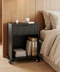 Heavy Duty Swivel Caster Wheels One Inch Diameter With Flat Plate Mounting for a black nightstand on wheels beside a bed.