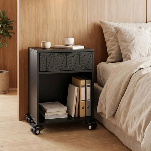 Heavy Duty Swivel Caster Wheels One Inch Diameter With Flat Plate Mounting for a black nightstand on wheels beside a bed.