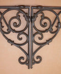 Kick Up Your Space With These Heavy Duty Victorian Corner Shelf Brackets Solid Cast Iron Rustic Brown Finish Built Tough For Windows Vintage Look Set Of Four detailed view of ornate cast iron bracket.