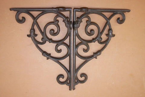Kick Up Your Space With These Heavy Duty Victorian Corner Shelf Brackets Solid Cast Iron Rustic Brown Finish Built Tough For Windows Vintage Look Set Of Four detailed view of ornate cast iron bracket.