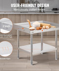 Stainless Steel Grill Stand Table 24 By 28 By 26 Inches With Adjustable Undershelf Built Tough For Home Kitchen Restaurant And Hotel Use Commercial Grade Work Table with two adjustable shelves and 3-sided backsplash in a modern kitchen setting.