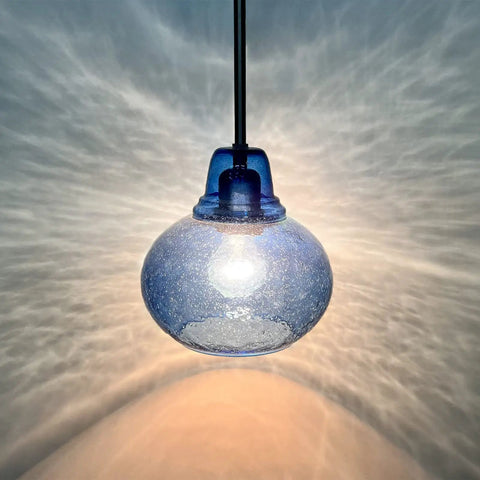Close-up of Two Pack Kitchen Island Pendant Lights With Hand Blown Brownish Blue Seeded Glass Shades Brushed Nickel Finish Modern Farmhouse Vibe Over Sink Dimmable LED Compatible One Light Per Pendant
