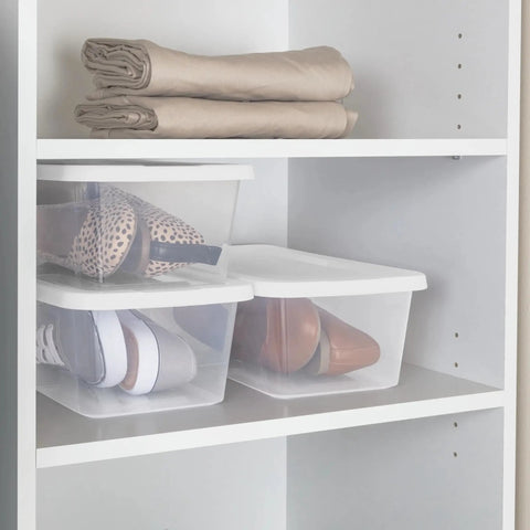 Clear Plastic Storage Bins With Lids 6 Quart Stackable Organizer Boxes for closet holding shoes and linens in white shelving.