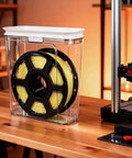 Moisture Proof And Dust Proof 3D Printing Filament Storage Box Set with filament spool on wooden table