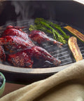 Grill Game Strong 13 Inch Cast Iron Cookin Grid For S And MiniMax Big Green Egg with grilled chicken and vegetables.