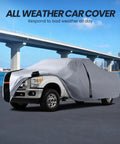 Ford F250 Custom Fit Truck Cover for Crew Cab Short Bed 2001 To 2026 All Weather Waterproof covering silver truck near bridge