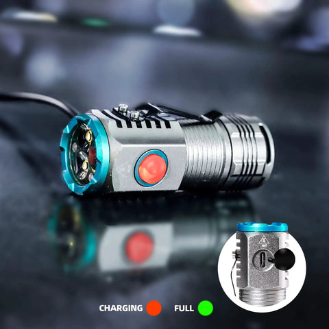 Beefy 1100 Lumen Pocket Flashlight With 4 Modes shown charging with USB, red power button, indicator lights, metal body, clip on.
