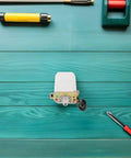 Sewing Machine Motor Repair Kit With Metal Frame And Pulley 70W Single Motor Replacement Component For Home Sewing Machine Upgrade Built For Stability And Smooth Operation No More Misalignment on teal wood with tools