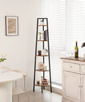 Deadly Solid 5 Tier Corner Bookcase With Heavy Steel Frame And Thick Rustic Wood Shelves, showcasing a ladder design with plants and dishes.