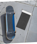 Two Pack Black PVC Grip Tape Sheets For Skateboard And Scooter Decks Weatherproof No Slip Traction Tape next to skateboard